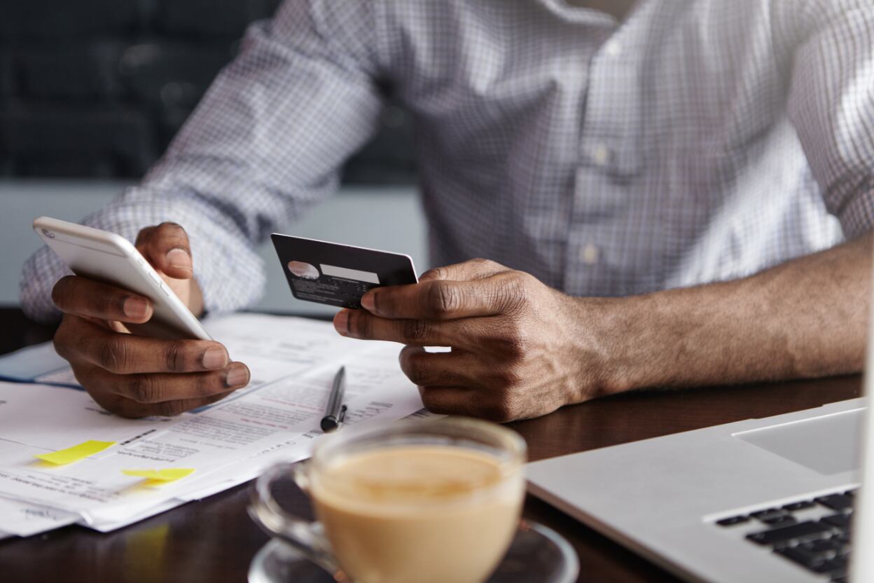 A man checking his bank account online.