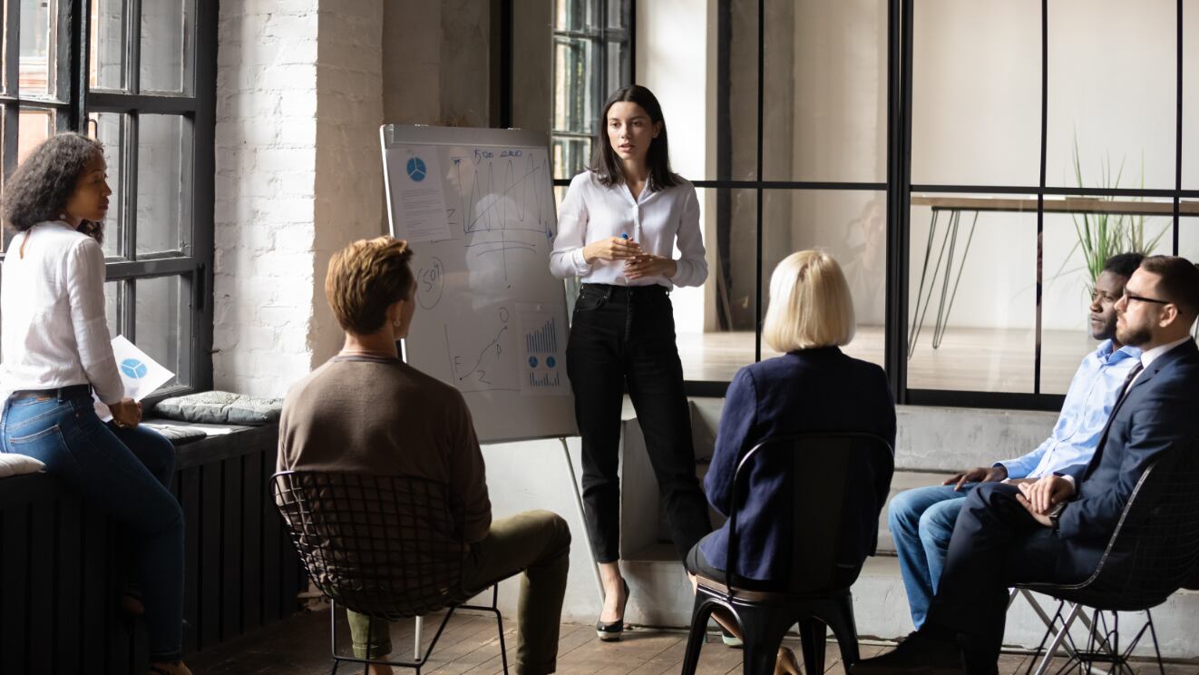 A meeting with employees of a small business. 